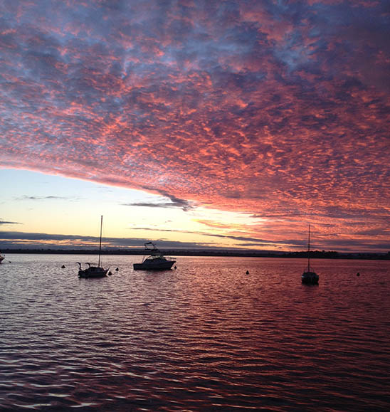 Sunrise in Perth Harbor, Australia. Photo by SS
